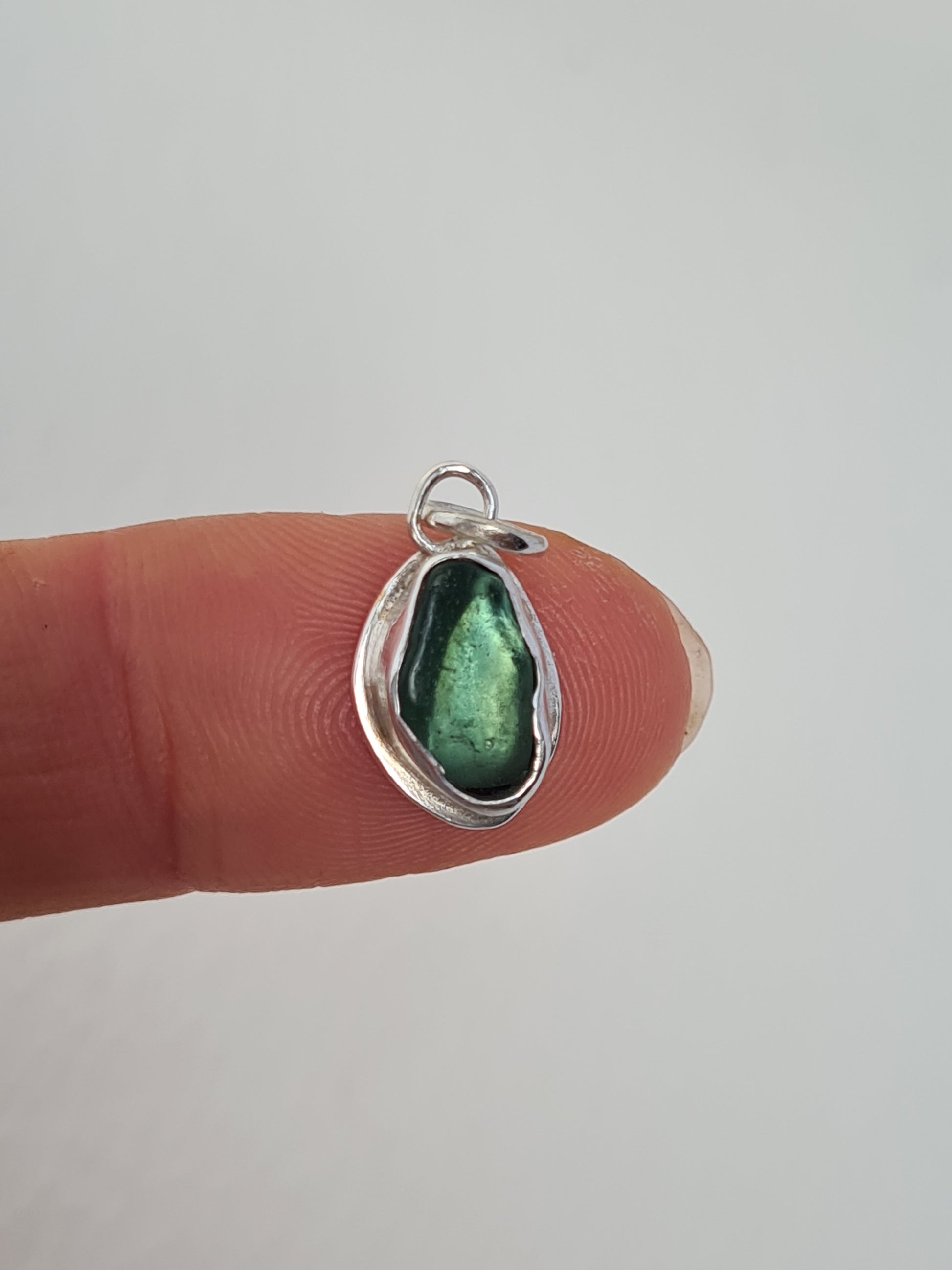 This little aquamarine sea gem is nestled in a sterling silver bezel on a delicate silver cable chain. Handmade with sustainability in mind this silver necklace is made from 100% recycled silver.