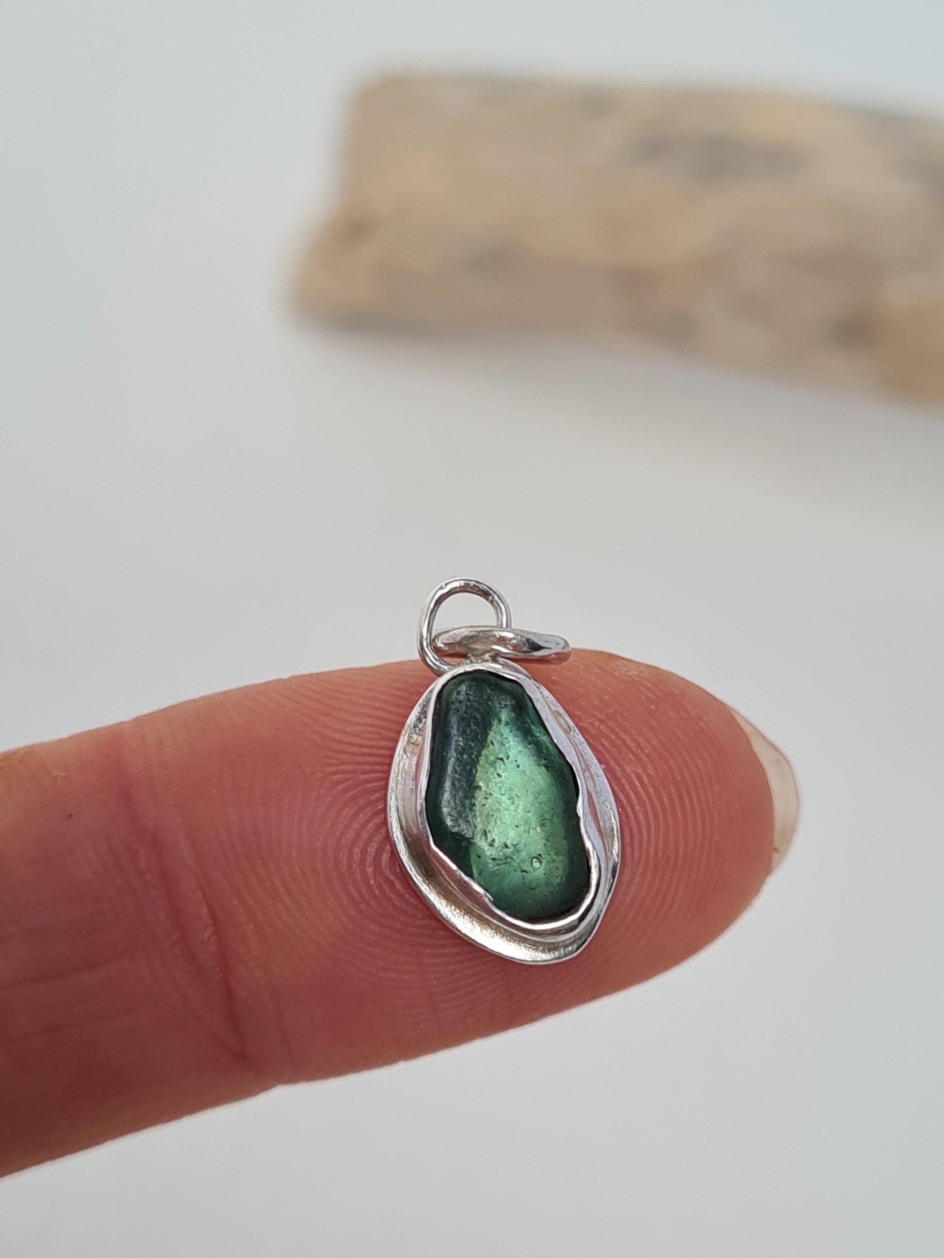This little aquamarine sea gem is nestled in a sterling silver bezel on a delicate silver cable chain. Handmade with sustainability in mind this silver necklace is made from 100% recycled silver.